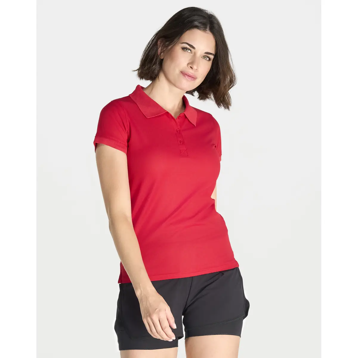 Polo deportivo mujer JHK SPORTPQLADY 1 Polo JHK SPORTPQLADY en rojo, vista frontal con modelo