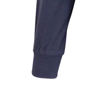 Polo Mukua HOBART en color Denim Blue, detalle del puño