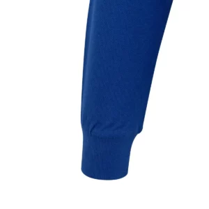 Polo Mukua HOBART WOMAN en color Royal Blue, detalle del puño