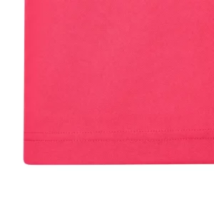 Polo Mukua BOGAN en color Fluor Coral, detalle del tejido