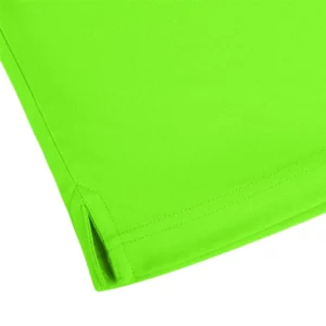 Polo Mukua BOGAN en color Lime Flúor, detalle del bajo