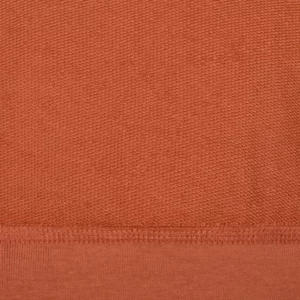Sudadera Mukua STCN300U en Carrot, detalle de la prenda