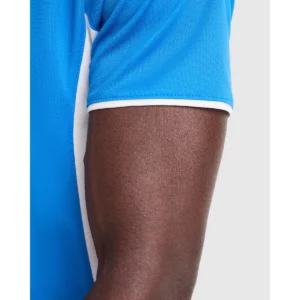 Polo Roly MONTMELO en azul royal y blanco, detalle de la manga