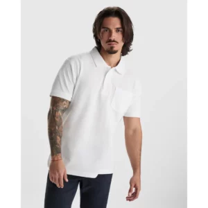 Polo Roly CENTAURO PREMIUM en blanco, vista frontal con modelo