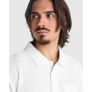 Polo Roly CENTAURO PREMIUM en blanco, detalle del cuello y la tapeta
