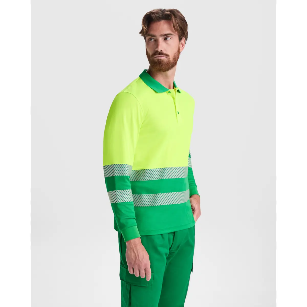 Polo alta visibilidad manga larga Roly ATRIO LS 1 Polo Roly ATRIO LS en verde jardín y amarillo flúor de manga larga, vista frontal con modelo