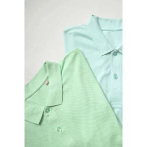 Polo Sol’s PLANET WOMEN detalle de cuellos y botones de dos polos en tonos verdes