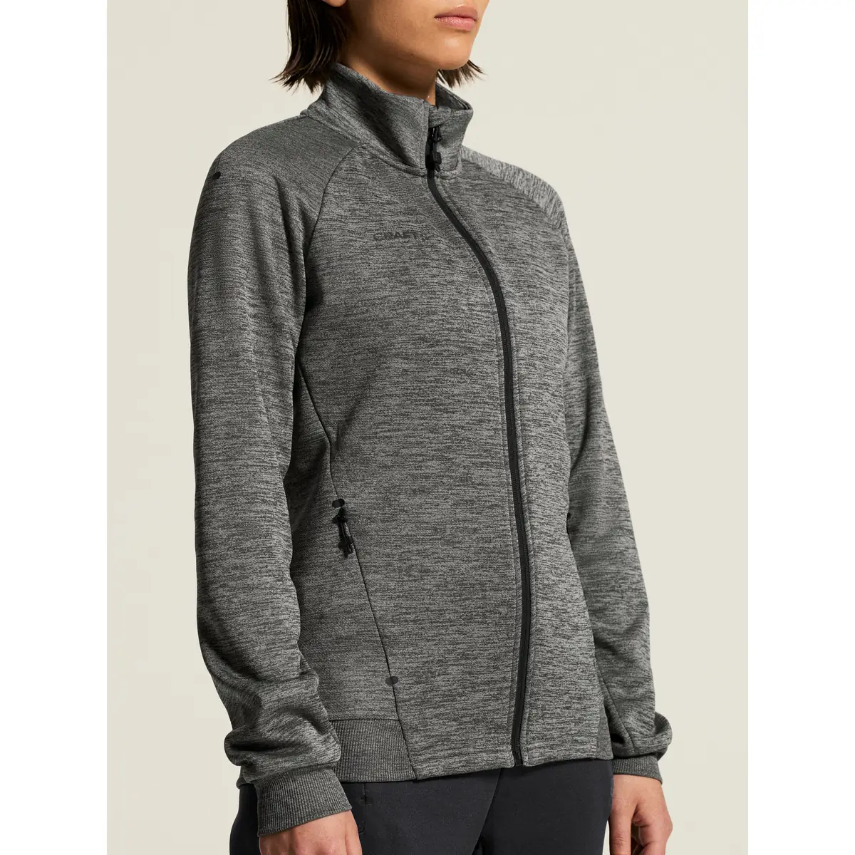 Chaqueta mujer CRAFT ADV UNIFY JACKET 1909135 74 Chaqueta mujer CRAFT ADV UNIFY JACKET 1909135, Dark grey melange, con modelo, detalle frontal