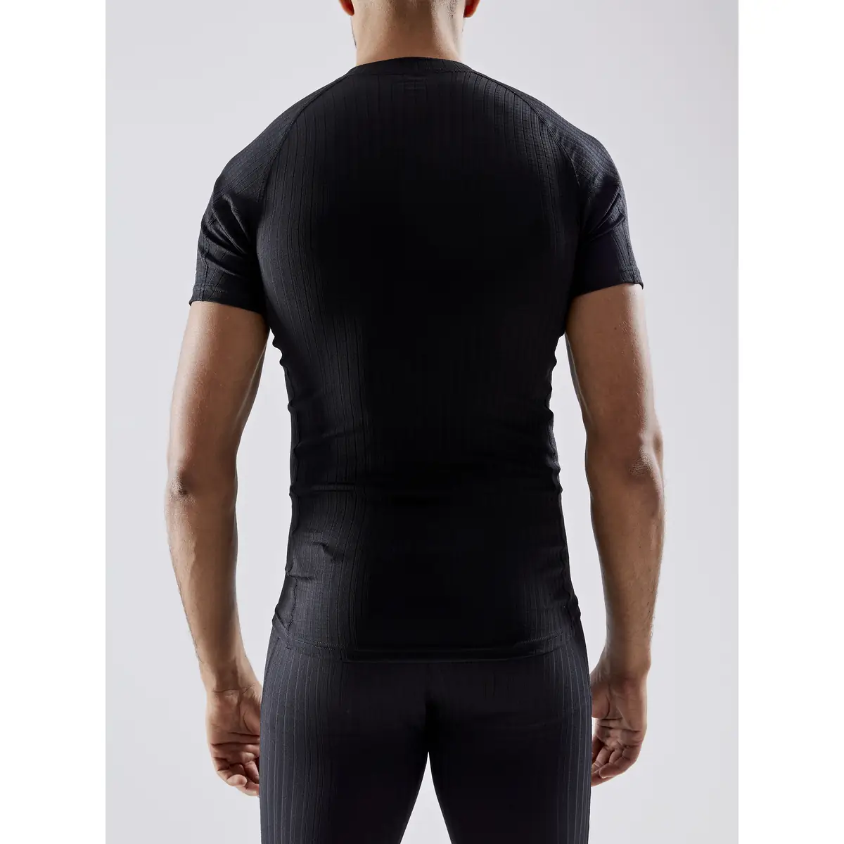 Camiseta interior hombre CRAFT ACTIVE EXTREME X SS 1909678 2 Camiseta interior hombre CRAFT ACTIVE EXTREME X SS 1909678, con modelo, vista posterior