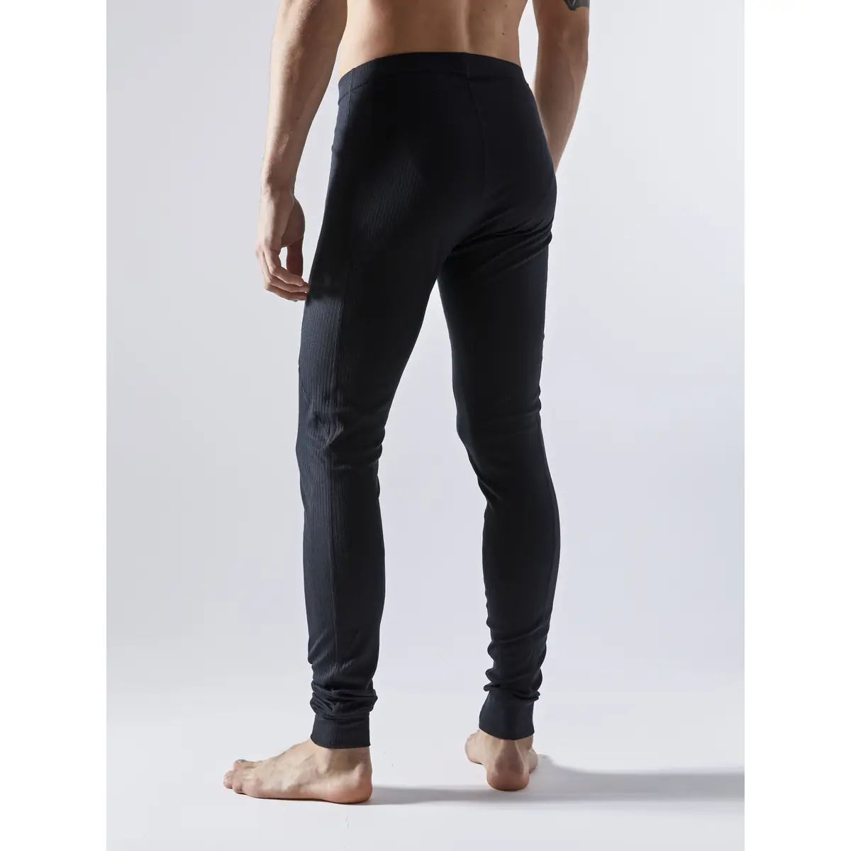 Conjunto hombre CRAFT CORE DRY BASELAYER SET 1909707 9 Conjunto hombre CRAFT CORE DRY BASELAYER SET 1909707, Negro, con modelo, vista posterior de tres cuartos de la malla