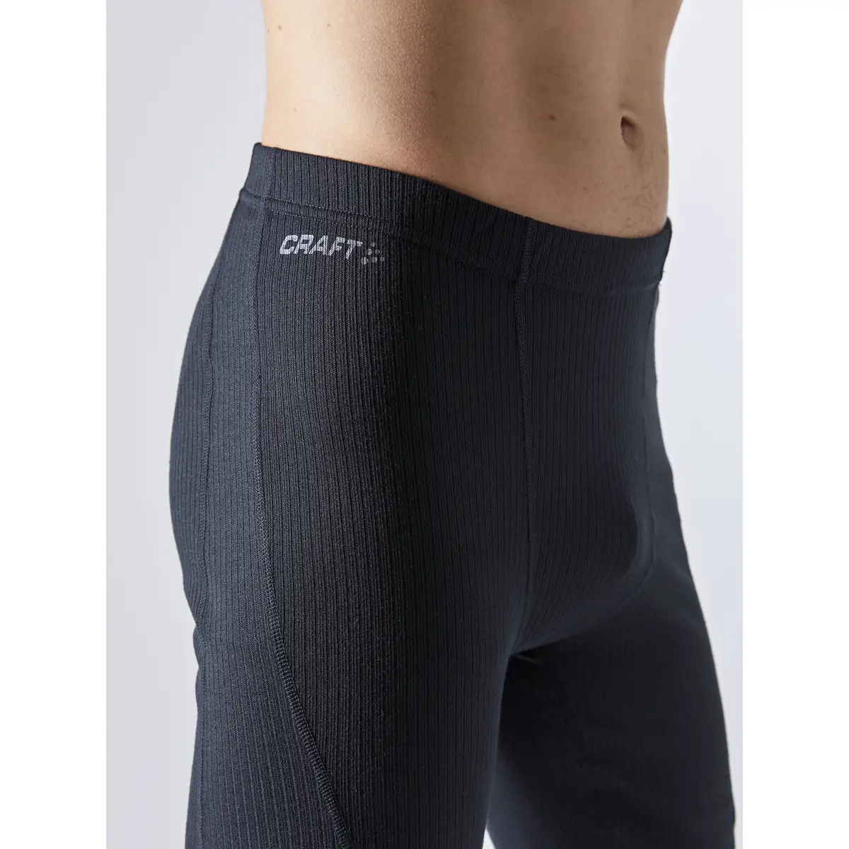 Conjunto hombre CRAFT CORE DRY BASELAYER SET 1909707 10 Conjunto hombre CRAFT CORE DRY BASELAYER SET 1909707, Negro, con modelo, detalle de la cintura de la malla