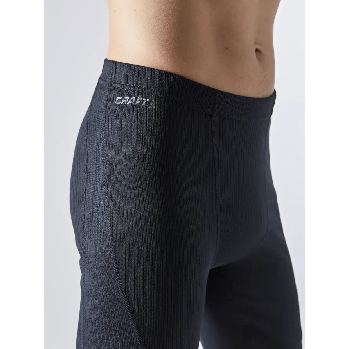 Conjunto hombre CRAFT CORE DRY BASELAYER SET 1909707 13 Conjunto hombre CRAFT CORE DRY BASELAYER SET 1909707, Negro, con modelo, detalle de la cintura de la malla