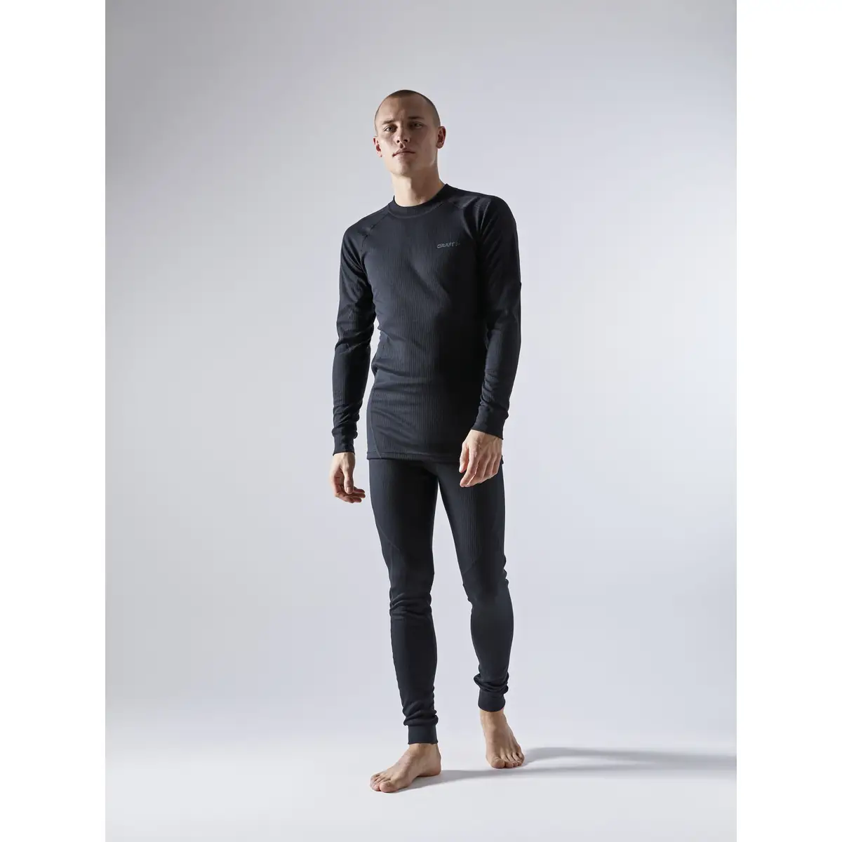 Conjunto hombre CRAFT CORE DRY BASELAYER SET 1909707 14 Conjunto hombre CRAFT CORE DRY BASELAYER SET 1909707, Negro, con modelo, vista frontal del conjunto