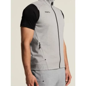 Chaleco hombre CRAFT ADV UNIFY VEST 1912161, Grey melange, con modelo, detalle del bolsillo y el lateral