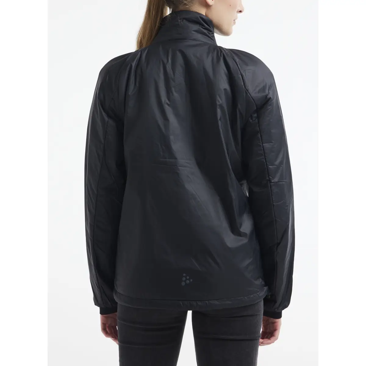 Chaqueta mujer CRAFT CORE LIGHT PADDED JACKET 1912216 18 Chaqueta mujer CRAFT CORE LIGHT PADDED JACKET 1912216, Negro, con modelo, vista posterior de tres cuartos