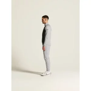 Chaqueta hombre CRAFT ADV UNIFY HYBRID JACKET 1912224, Grey melange/Black, con modelo, vista lateral de cuerpo entero