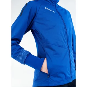 Chaqueta mujer CRAFT ADV NORDIC SKI CLUB JACKET 1912525, Club cobolt, con modelo, detalle del bolsillo lateral