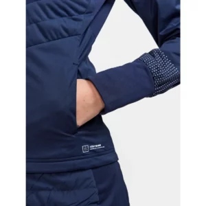 Chaqueta mujer CRAFT ADV NORDIC SKI CLUB JACKET 1912525, Blaze, con modelo, detalle del bolsillo lateral