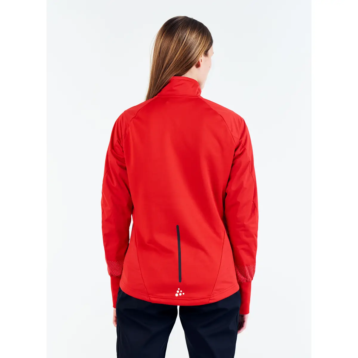 Chaqueta mujer CRAFT ADV NORDIC SKI CLUB JACKET 1912525 21 Chaqueta mujer CRAFT ADV NORDIC SKI CLUB JACKET 1912525, Bright red, con modelo, vista posterior de tres cuartos