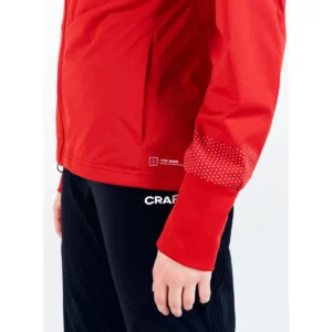 Chaqueta mujer CRAFT ADV NORDIC SKI CLUB JACKET 1912525, Bright red, con modelo, detalle de la manga y el puño