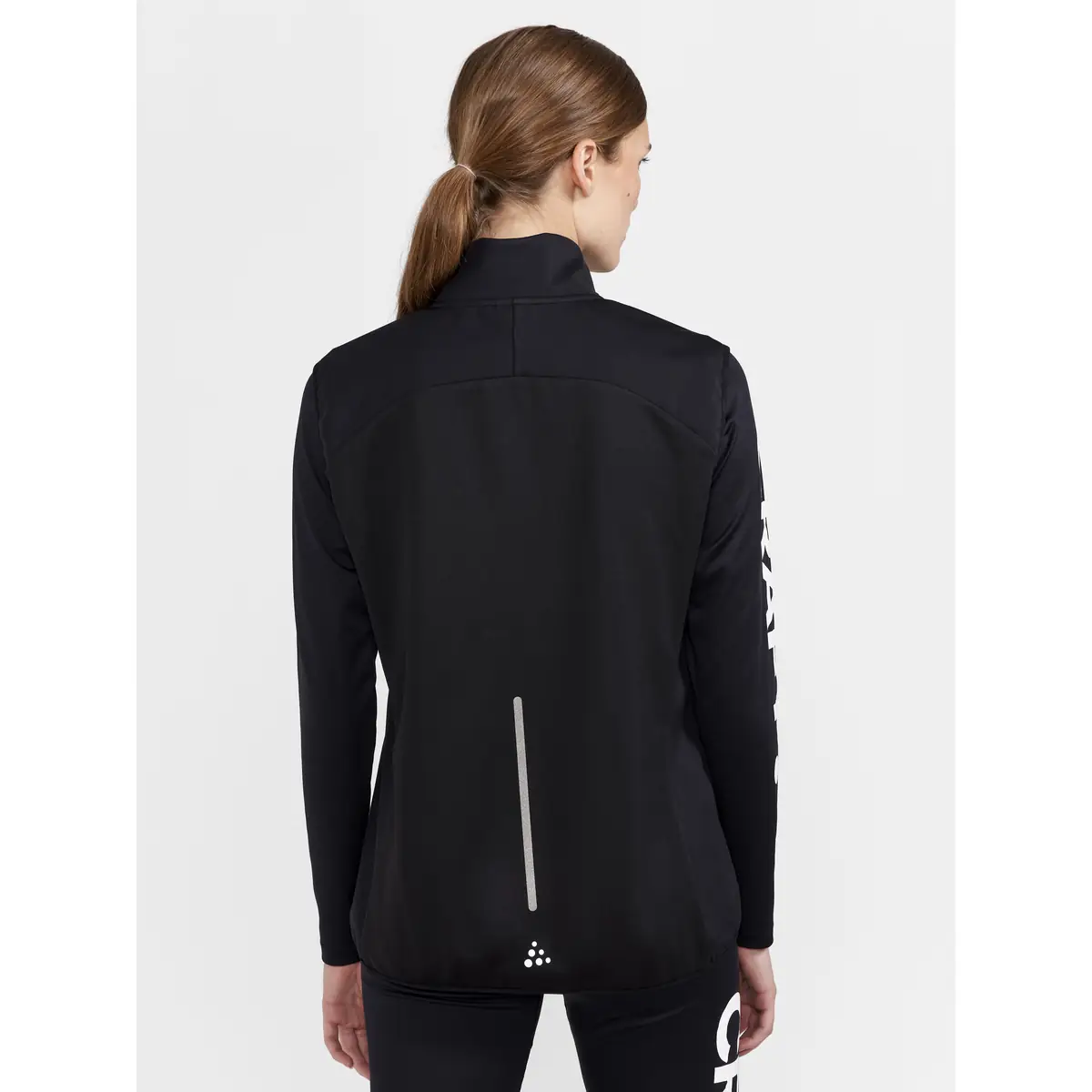 Chaleco mujer CRAFT ADV NORDIC SKI CLUB VEST 1912526 26 Chaleco mujer CRAFT ADV NORDIC SKI CLUB VEST 1912526, Negro, con modelo, vista posterior de tres cuartos