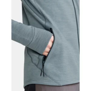 Chaqueta hombre CRAFT PRO EXPLORE WOOL MIDLAYER 1913800, Flow melange, con modelo, detalle del bolsillo lateral