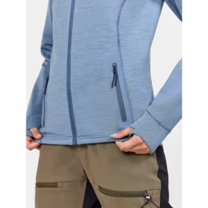 Chaqueta mujer CRAFT PRO EXPLORE WOOL MIDLAYER 1913801, Flow melange, con modelo, detalle de bolsillos y bajo