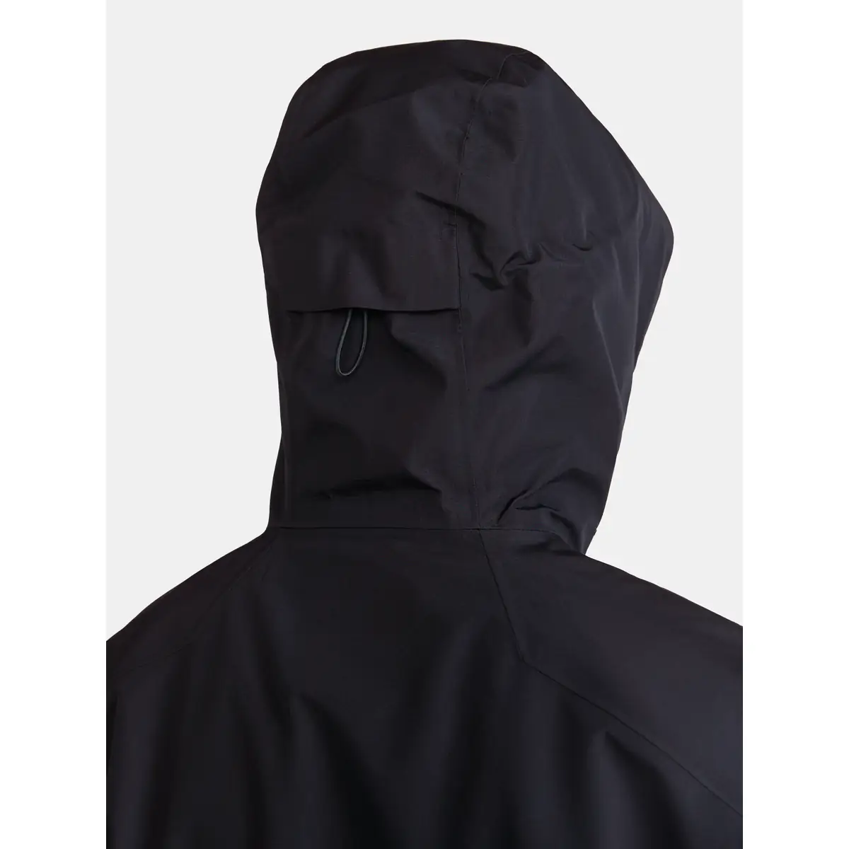 Chaqueta hombre CRAFT ADV EXPLORE SHELL JACKET 1913806 29 Chaqueta hombre CRAFT ADV EXPLORE SHELL JACKET 1913806, Negro, detalle posterior de la capucha