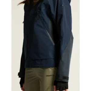Chaqueta mujer CRAFT ADV EXPLORE SHELL JACKET 1913807, Blaze, con modelo, detalle del bolsillo y manga