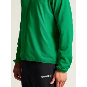 Chaqueta hombre CRAFT RUSH 2.0 TRAINING JACKET 1914672, Team green, con modelo, detalle de la manga y el bajo