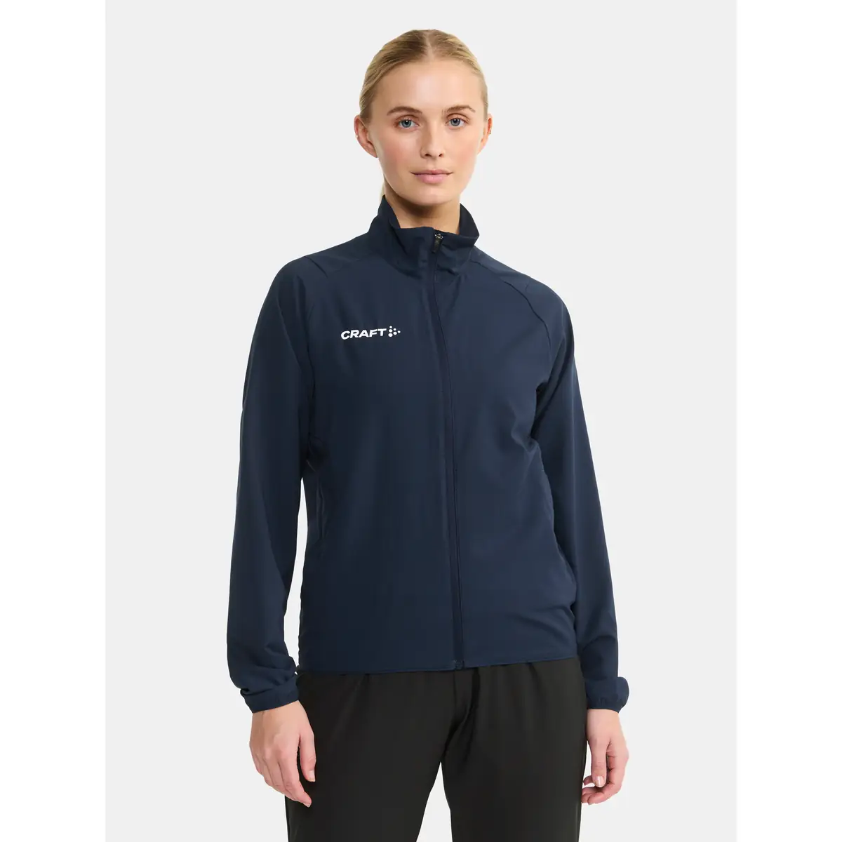 Chaqueta mujer CRAFT RUSH 2.0 TRAINING JACKET 1914673 10 Chaqueta mujer CRAFT RUSH 2.0 TRAINING JACKET 1914673, Marino, con modelo, vista frontal