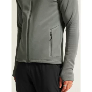 Chaqueta polar hombre CRAFT EXPLORE POWER FLEECE 1915240, Leaf, con modelo, detalle del bolsillo lateral