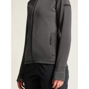 Chaqueta polar mujer CRAFT EXPLORE POWER FLEECE 1915241, Granite, con modelo, detalle de bolsillo y puño
