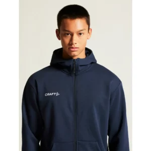 Sudadera hombre CRAFT COMMUNITY 2.0 LOGO FZ HOODIE 1915295, con modelo, detalle del cuello y la cremallera