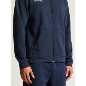 Sudadera hombre CRAFT COMMUNITY 2.0 LOGO FZ HOODIE 1915295, con modelo, detalle del bolsillo y el puño