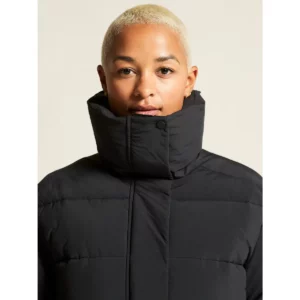 Abrigo mujer CRAFT URBAN LONG PADDED COAT 1916376, Negro, con modelo, detalle frontal de cuello y pecho