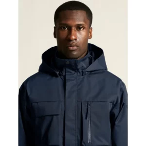 Chaqueta hombre CRAFT URBAN JACKET 1916379, Blaze, con modelo, detalle frontal de cuello y pecho
