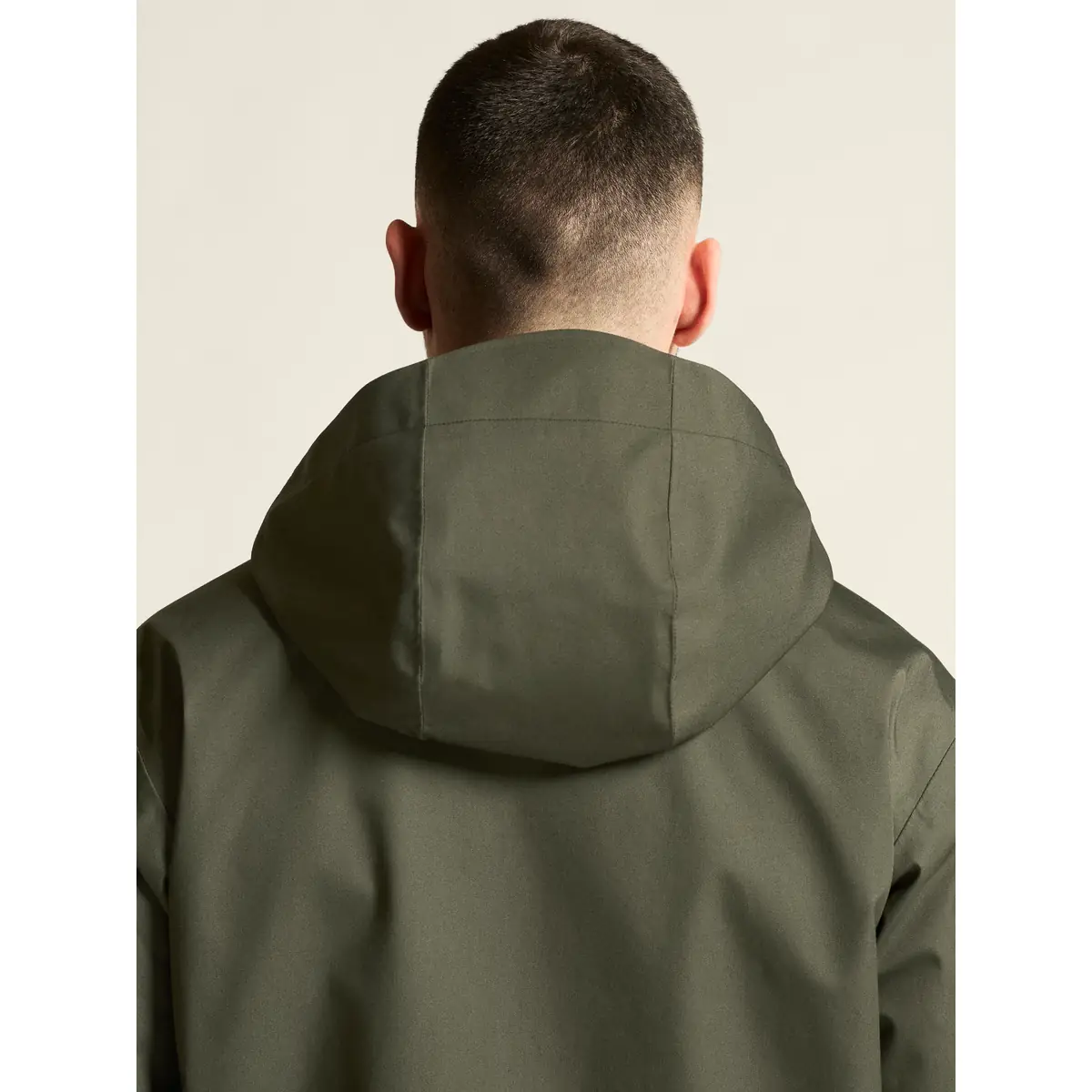Chaqueta hombre CRAFT URBAN JACKET 1916379 29 Chaqueta hombre CRAFT URBAN JACKET 1916379, Chimera, con modelo, detalle posterior de capucha y hombros