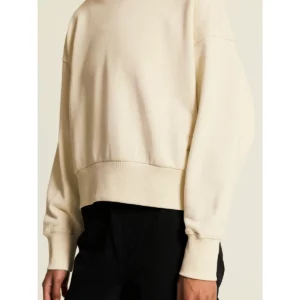 Sudadera mujer CRAFT FREQUENT CROPPED RN C17241, Tofu, con modelo, detalle del bajo y el puño