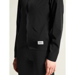 Cortavientos mujer CRAFT ENDUR LIGHT WIND JACKET C17326, Negro, con modelo, detalle del puño y bajo