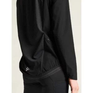 Cortavientos mujer CRAFT ENDUR LIGHT WIND JACKET C17326, Negro, con modelo, detalle interior del bajo