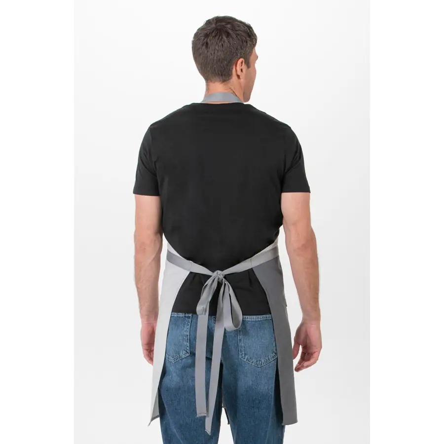 Delantal peto Dyneke 8129388 gris bicolor 2 Delantal peto gris asimétrico Dyneke 8129388: vista trasera del delantal y lazada.