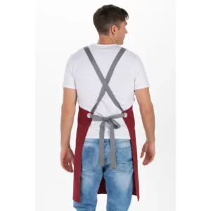 Delantal peto unisex granate bolsillos Dyneke 8164464: vista trasera del delantal con tirantes cruzados.