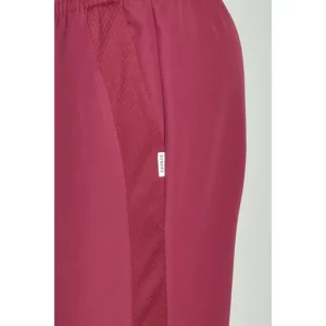 Pantalón unisex rejilla lateral granate Dyneke 8179484: detalle de la cintura, cordón y franja lateral.