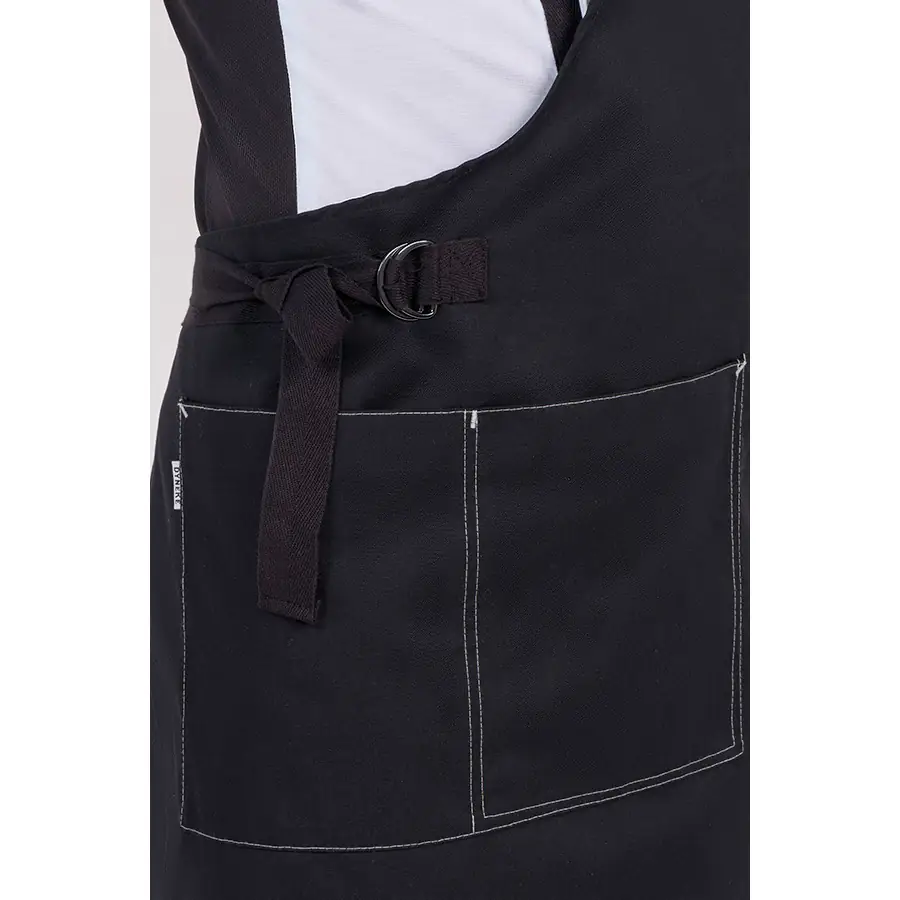 Delantal adaptable Dyneke 8505701 negro 4 Delantal conjunto chaqueta 8502 Dyneke 8505701: detalle de los bolsillos y cierre lateral.