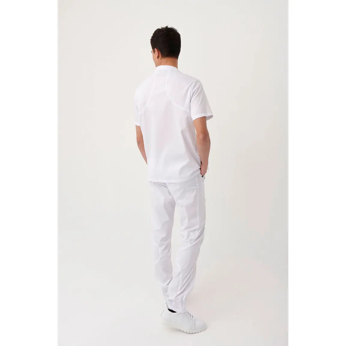 Pantalón sanitario Monza Drago 13.02 3 Pantalón sanitario unisex Monza Drago 13.02 - Blanco - posterior con persona