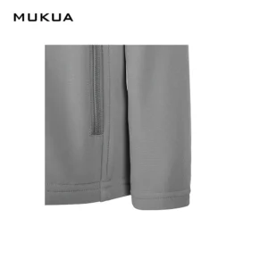 Softshell infantil Mukua RICHMOND KIDS SSZ280K Stone grey, detalle de puño y bajo