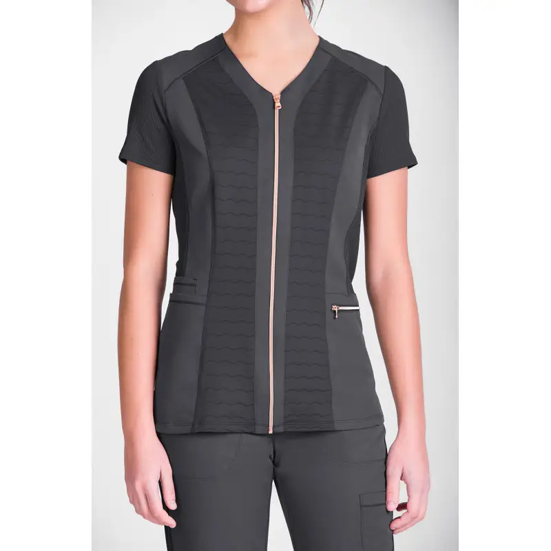 Túnica sanitaria de mujer Norvil 1146 1 Túnica sanitaria de mujer Norvil 1146 en gris oscuro, vista frontal, sobre modelo.