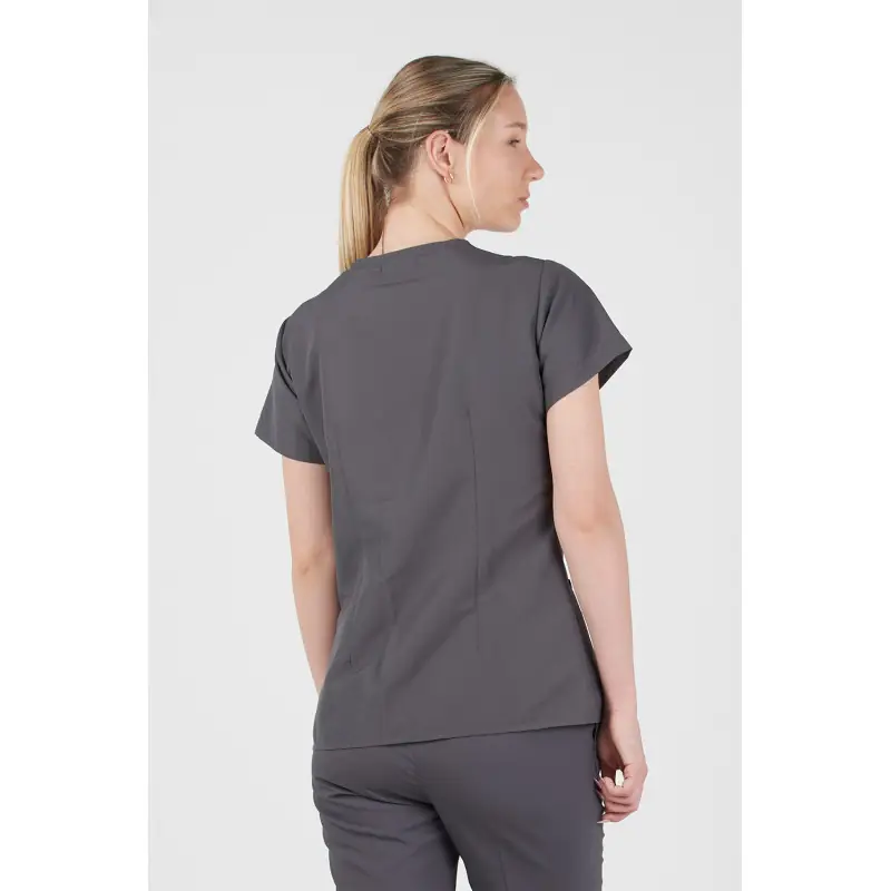 Casaca antilejía de mujer Norvil 1170 6 Casaca antilejía de mujer Norvil 1170 en gris oscuro, vista trasera, sobre modelo.