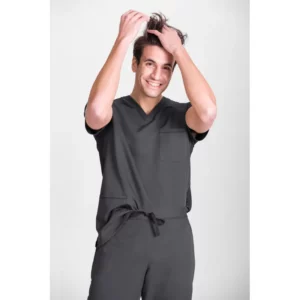 Pantalón sanitario unisex Norvil 1718 en gris oscuro, vista frontal, sobre modelo y encuadre parcial.